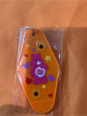 Orange Bear Keychain with Pink Bear and Sunflower Design